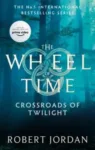 Crossroads of Twilight paperback, Orbit's September 2021 edition. The cover depicts a twilight haze in a forest with tall trees.