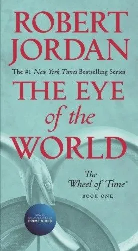 The Eye of the World paperback, October 2019 mass-market edition from Tor Books. The cover has the snake-wheel symbol on an aqua blue background.