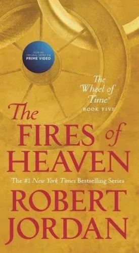 The Fires of Heaven paperback, December 2019 mass-market edition from Tor Books. The cover has the snake-wheel symbol on an orange background.