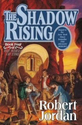 The Shadow Rising hardcover, September 1992 edition from Tor Books. The cover has Rand, Mat, and Egwene in the Aiel Waste.