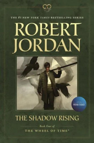 The Shadow Rising paperback, October 2012 edition from Tor Books. The cover features Mat Cauthon holding his ashandarei.