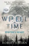 Winter's Heart paperback, Orbit's September 2021 edition. The cover depicts a snow covered mountain and the tops of trees.