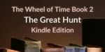 Old books on a brown background. Brown and white typography reads “The Wheel of Time Book 2: The Great Hunt Kindle Edition.”