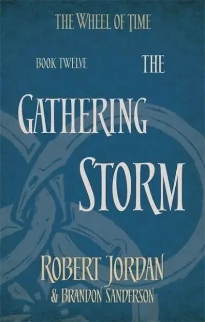 The Gathering Storm paperback, Orbit's 2014 edition. The cover has the snake-wheel symbol on a blue background.