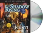 The Shadow Rising Audio CD read by Kate Reading & Michael Kramer. The sleeve has Rand, Mat, and Egwene by a wagon in the Aiel Waste.