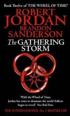 The Gathering Storm paperback. Orbit's 2010 edition. The cover has a red snake-wheel symbol on a black background.