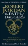 The Path of Daggers paperback. Time Warner Books UK's 1998 edition. The cover has a yellow snake-wheel symbol on a black background.