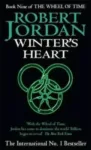 Winter's Heart paperback. Orbit's 2001 edition. The cover has a green snake-wheel symbol on a black background.