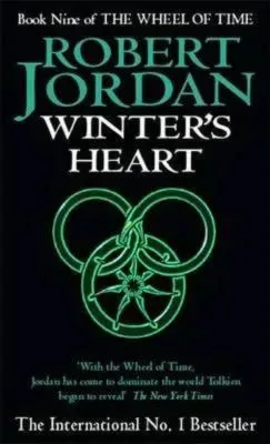 Winter's Heart paperback. Orbit's 2001 edition. The cover has a green snake-wheel symbol on a black background.