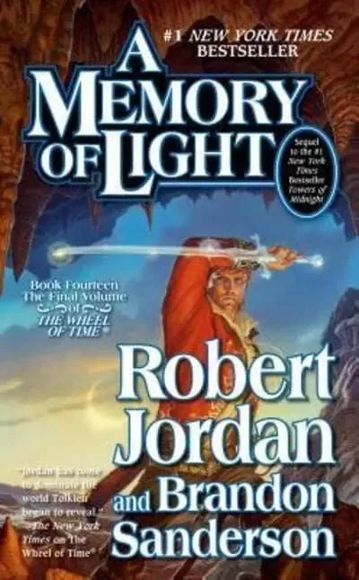 A Memory of Light paperback, December 2013 mass-market edition from Tor Books. The cover has Rand holding Callandor at Shayol Ghul.