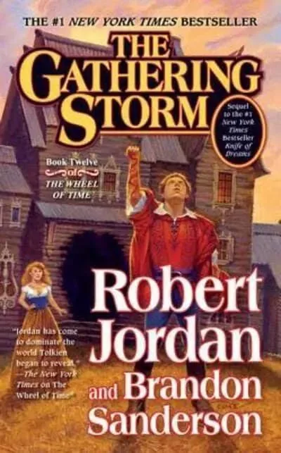 The Gathering Storm paperback, September 2010 mass-market edition from Tor Books. The cover features Rand al’Thor and Aviendha outside a manor house.