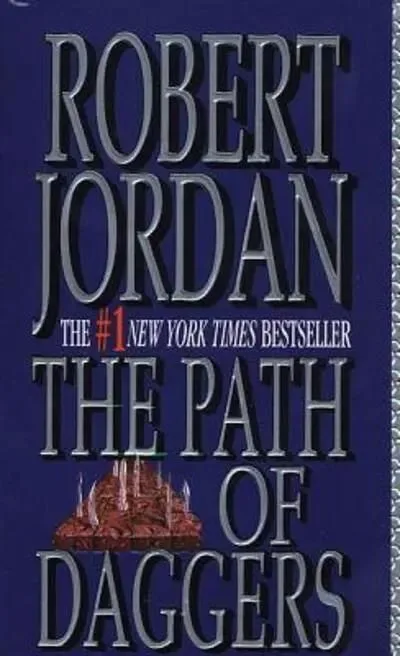 The Path of Daggers paperback, December 1999 mass-market edition from Tor Books. The cover has knives jutting up from a paving stone.